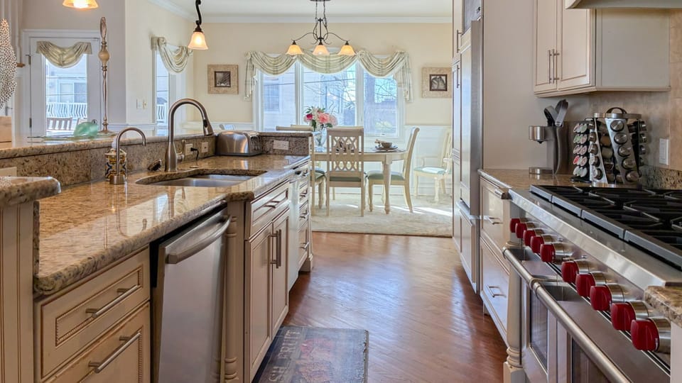 Gourmet Kitchen w/ 2 Sub Zero Refrigerators, 2 Dishwashers and 8 burner stove.