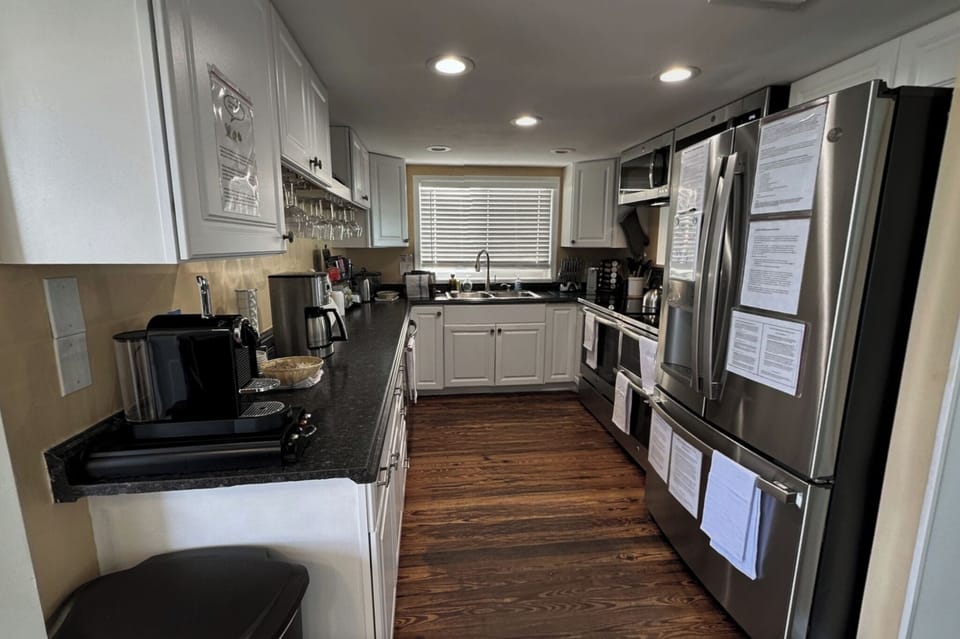 Double-oven open-floor plan kitchen.  (River + ocean views from the  kitchen!)