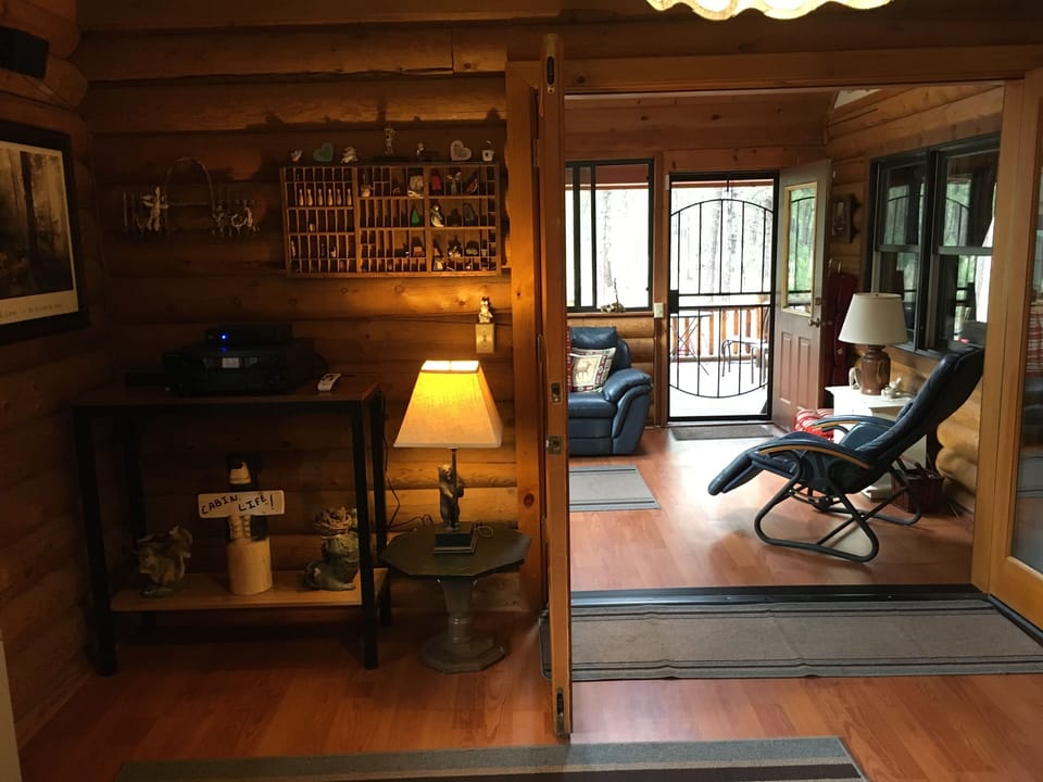 Stereo system office area with enclosed porch behind