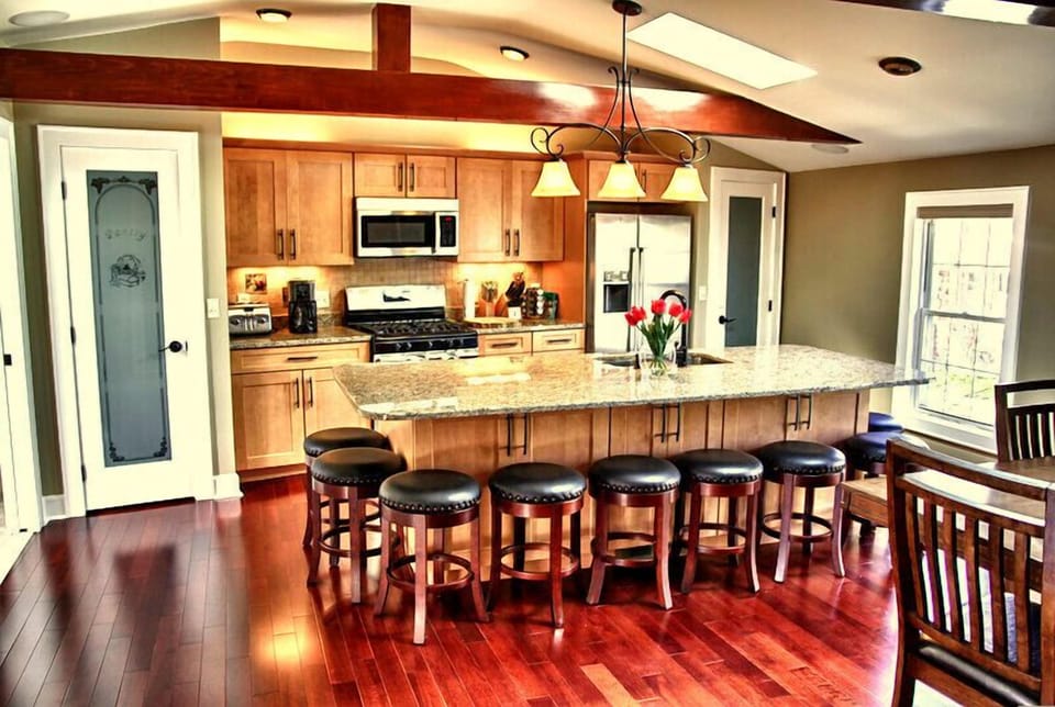 Large gourmet kitchen w/ island that seats 10 and another 8 at the dining table