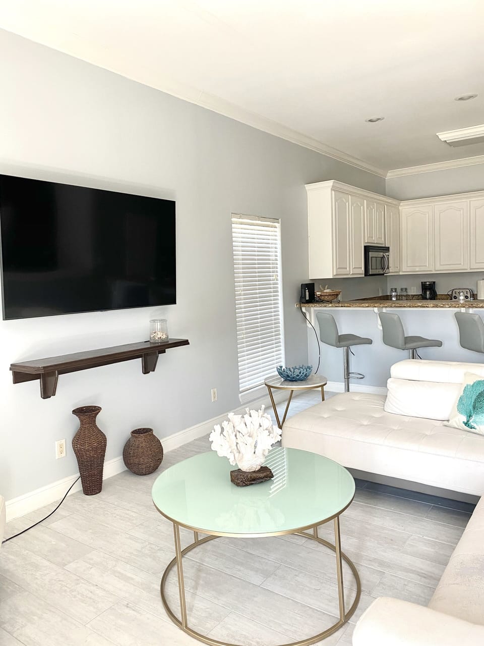 LIVING AREA WITH LARGE TV