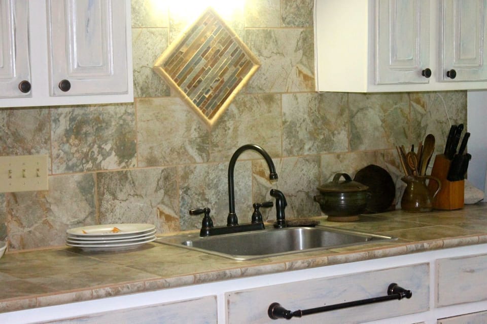 Details in the full kitchen make the place cozy.