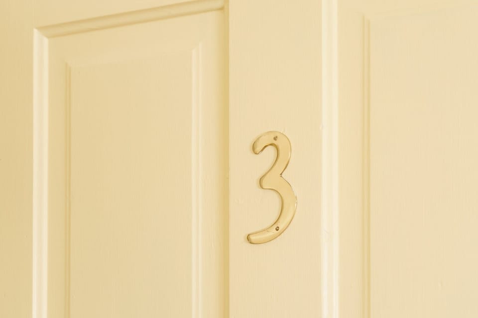 Apartment number 3 at he top of the stairs.
