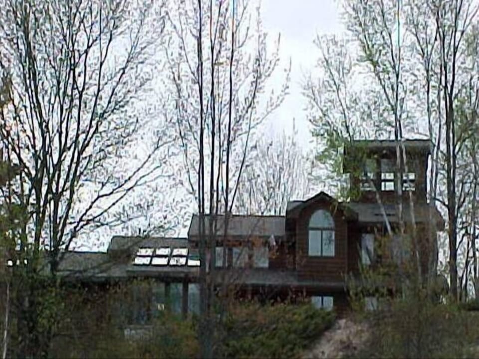 4000 sq ft Home on top of a sand dune bordering the Whitefish Dunes State Park