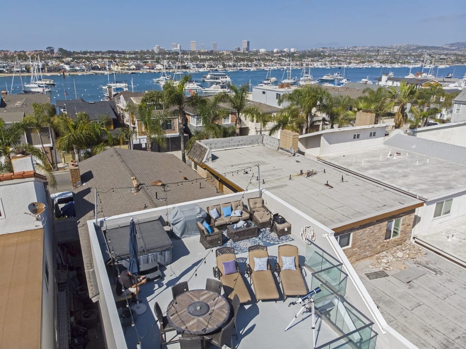 Aerial view of rooftop deck and distance to bay