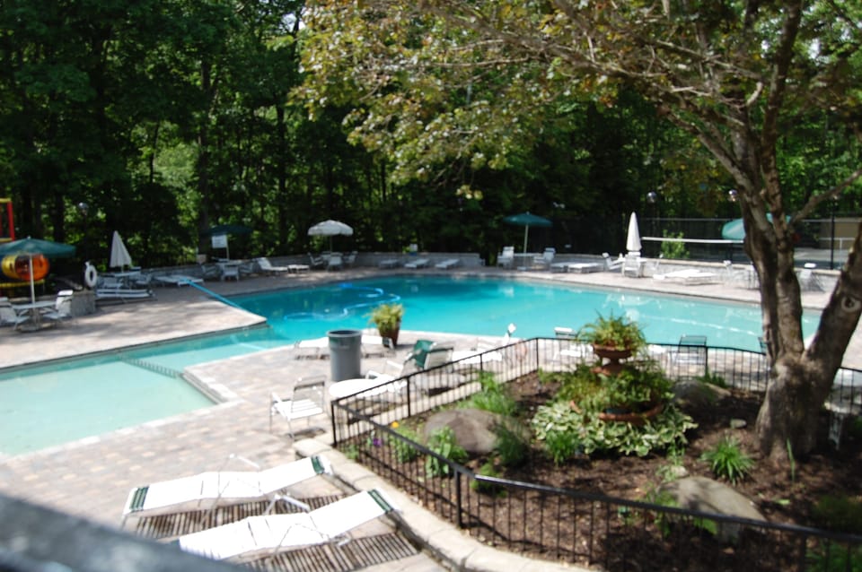 Club house has pool, tennis courts and play ground. 1 mile from the cabin!