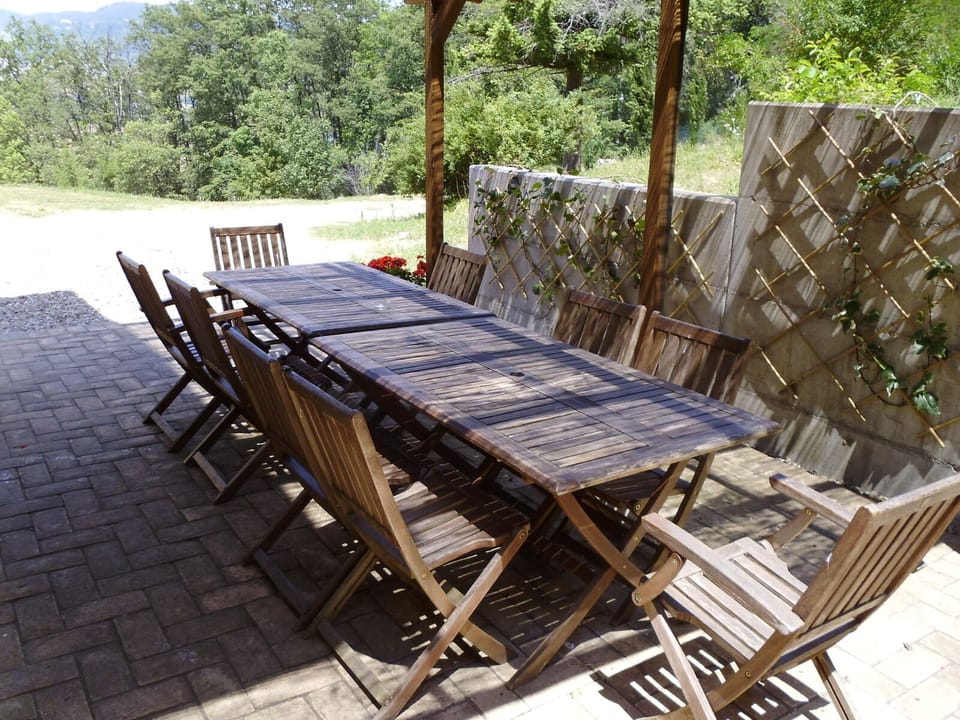 Dining terrace next to the kitchen perfect for all times of day.