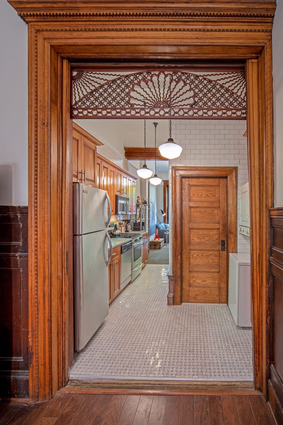 Bathroom door as seen from bedroom.