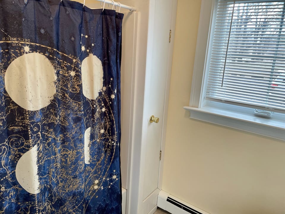 First level bathroom with tub