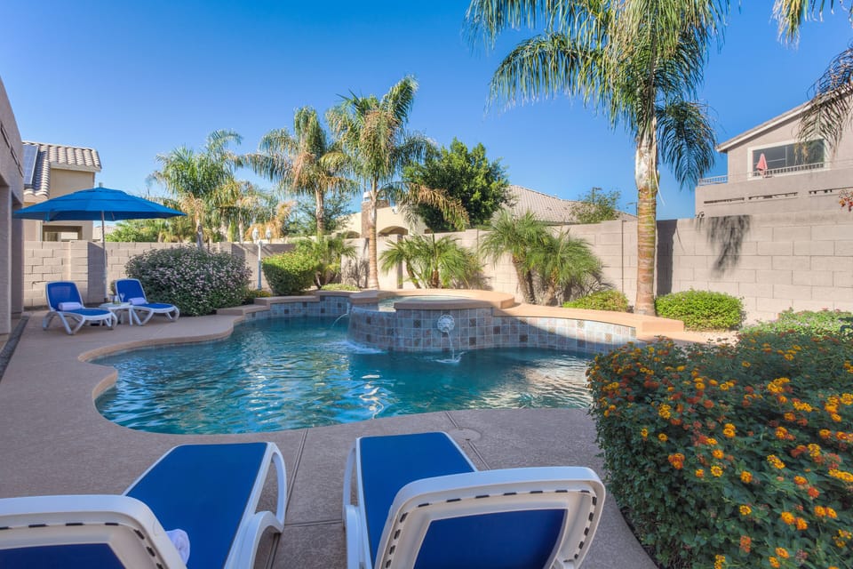 Resort Backyard with heated pool and attached spa