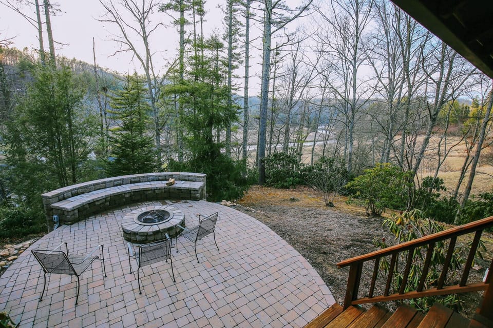 Our fire pit seating area offers you views of the New River below & stars above!