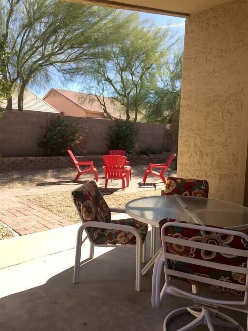Covered back patio with outside furniture
