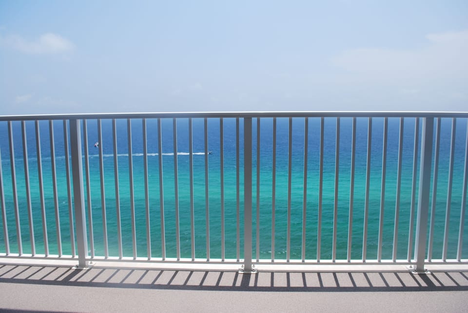 Endless emerald water views while watching dolphins and sting rays play