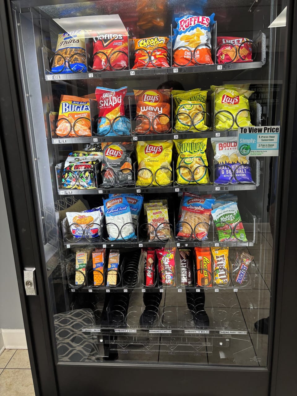 Buy wristbands & parking passes from 8th floor office vending machine @ check-in