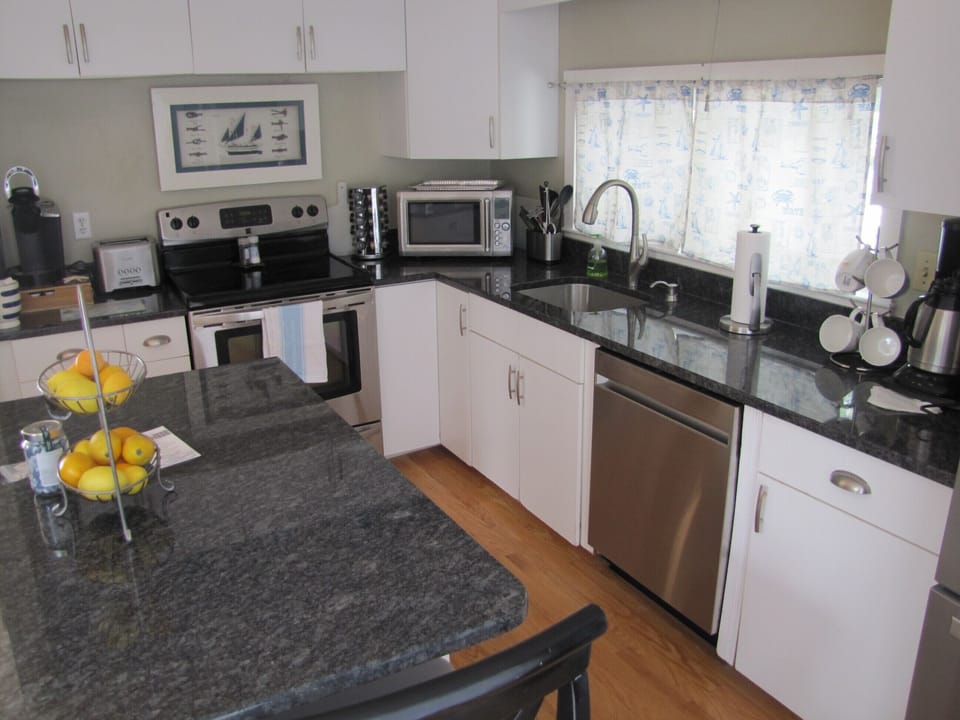 Kitchen with all the comforts of home. A Kuerig and regular coffee maker too!