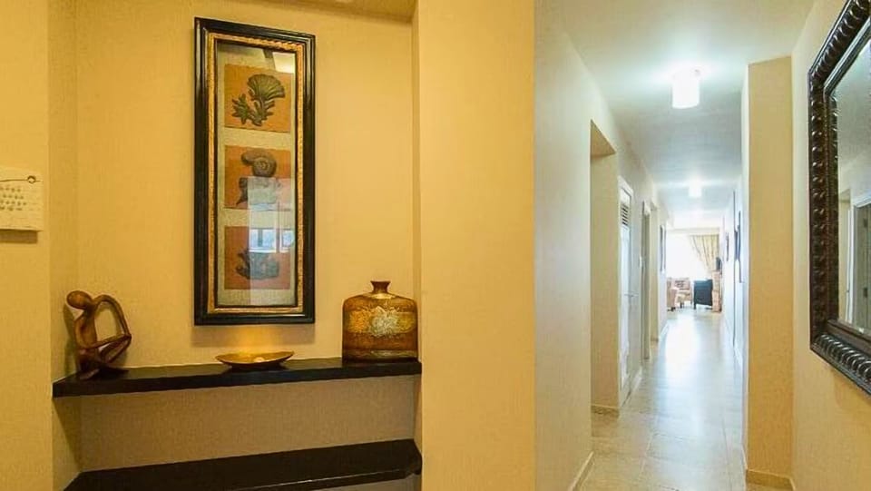 Air-conditioned hallway, showcasing the modern designs to entire unit. 