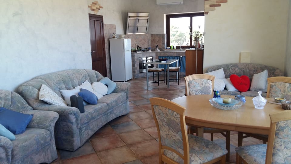 Living space, fitted kitchen and dining space