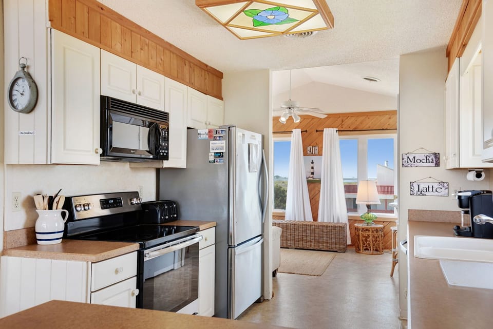 Stainless appliances include Kerurig and Drip Coffee Maker