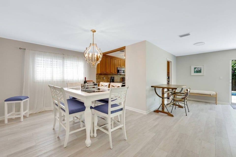 Chic dining table comfortably sits six