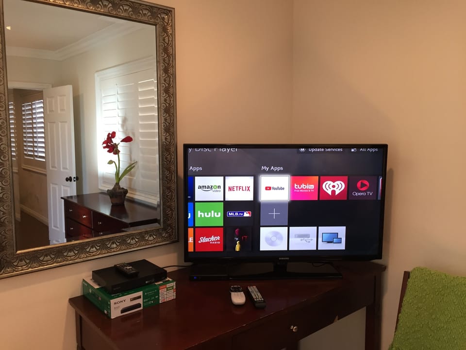 Netflix on HDMI 2, login in guests' account to watch. Direct TV on HDMI 1