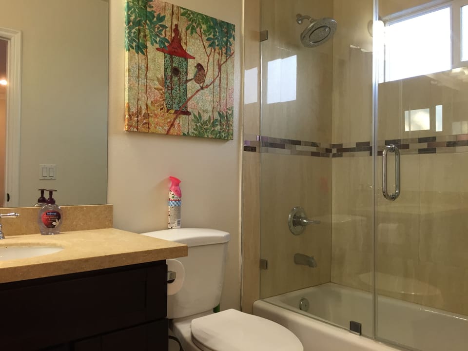 Bathroom attached master suite #1, hair dryer at cabinet