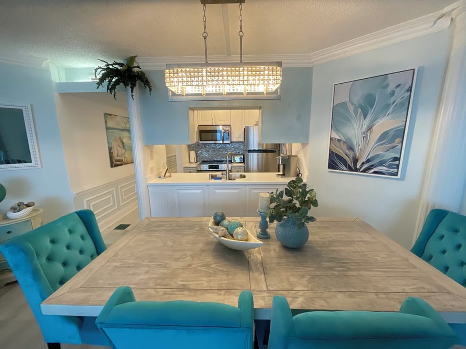 dining area seating for 6   4 chairs and bench great place for dinner and games!