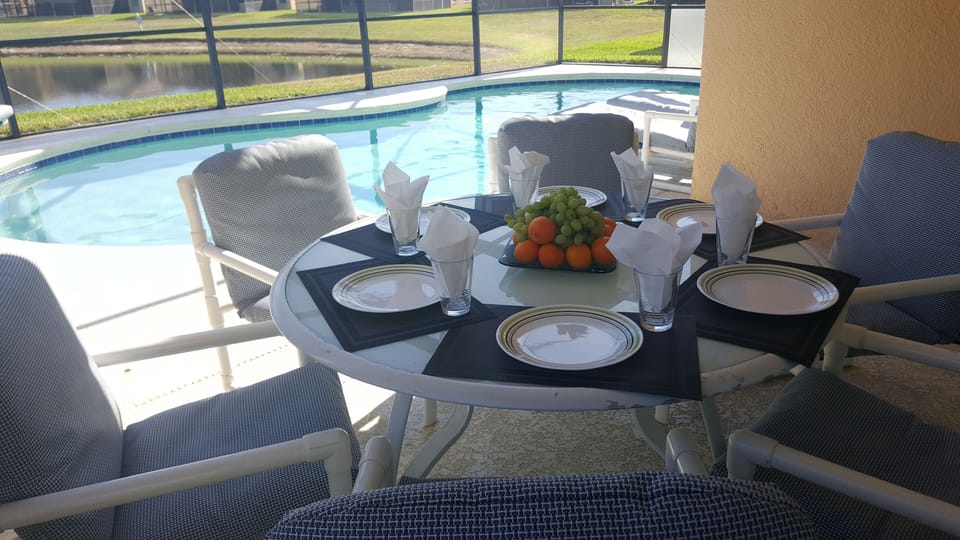 Lanai looking out to pool and pond