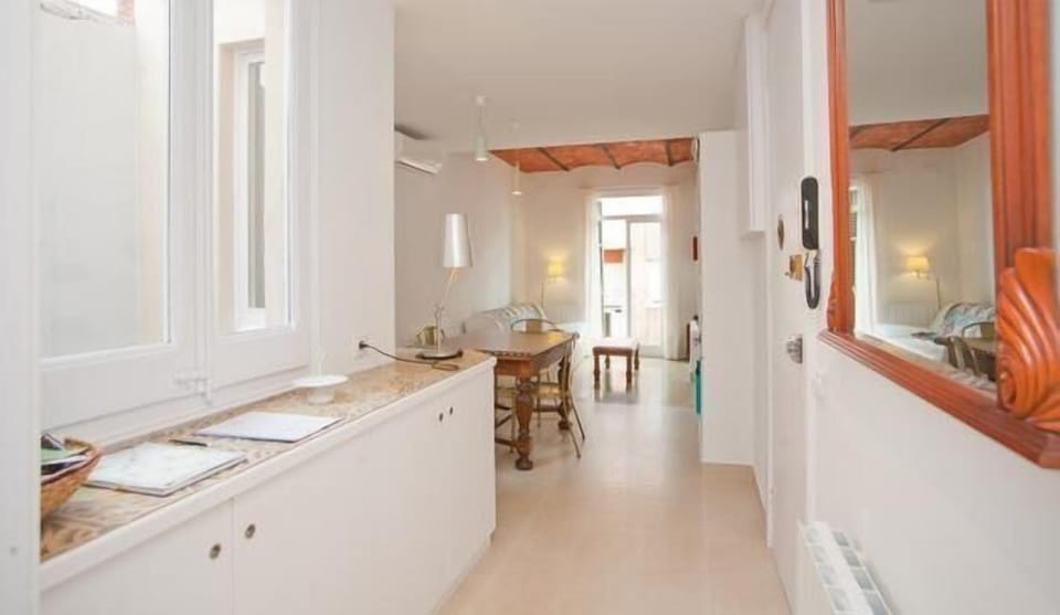 Hand made furniture with old 'hidrauliques' tiles, balcony, preserved ceiling.