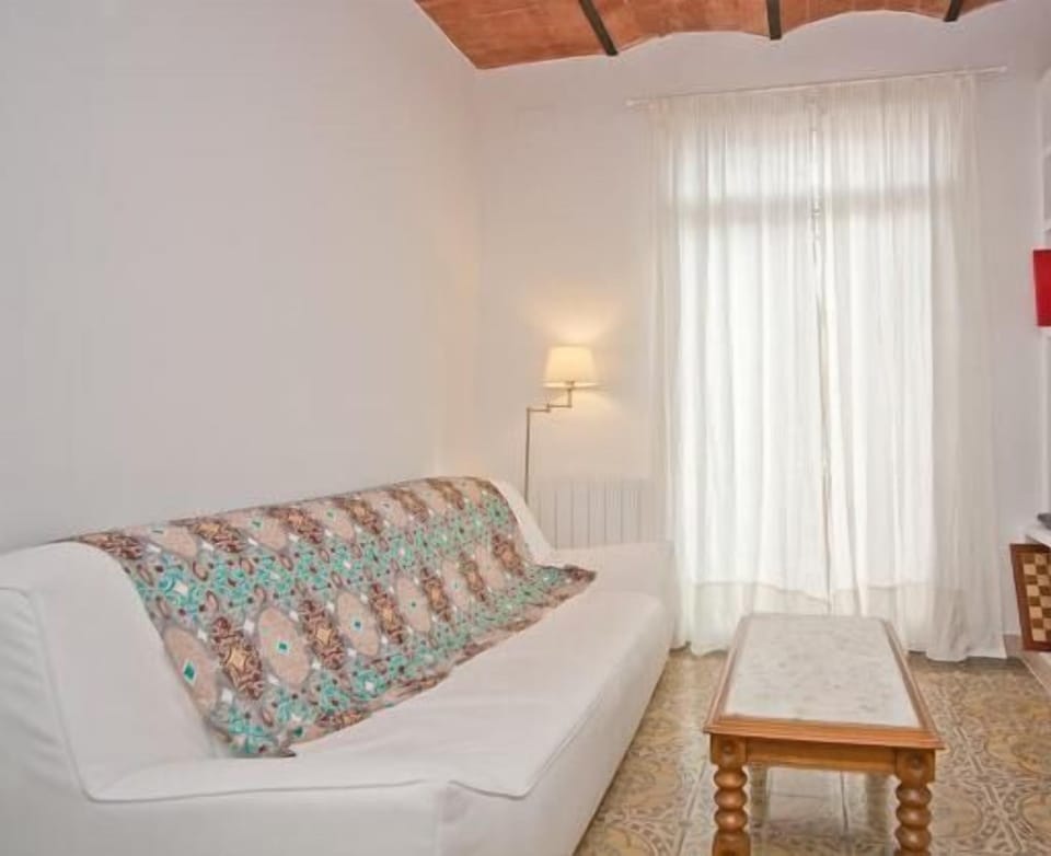 Designer white leather sofa, preserved tiles and ceiling,TV,DVD, Wifi, what else