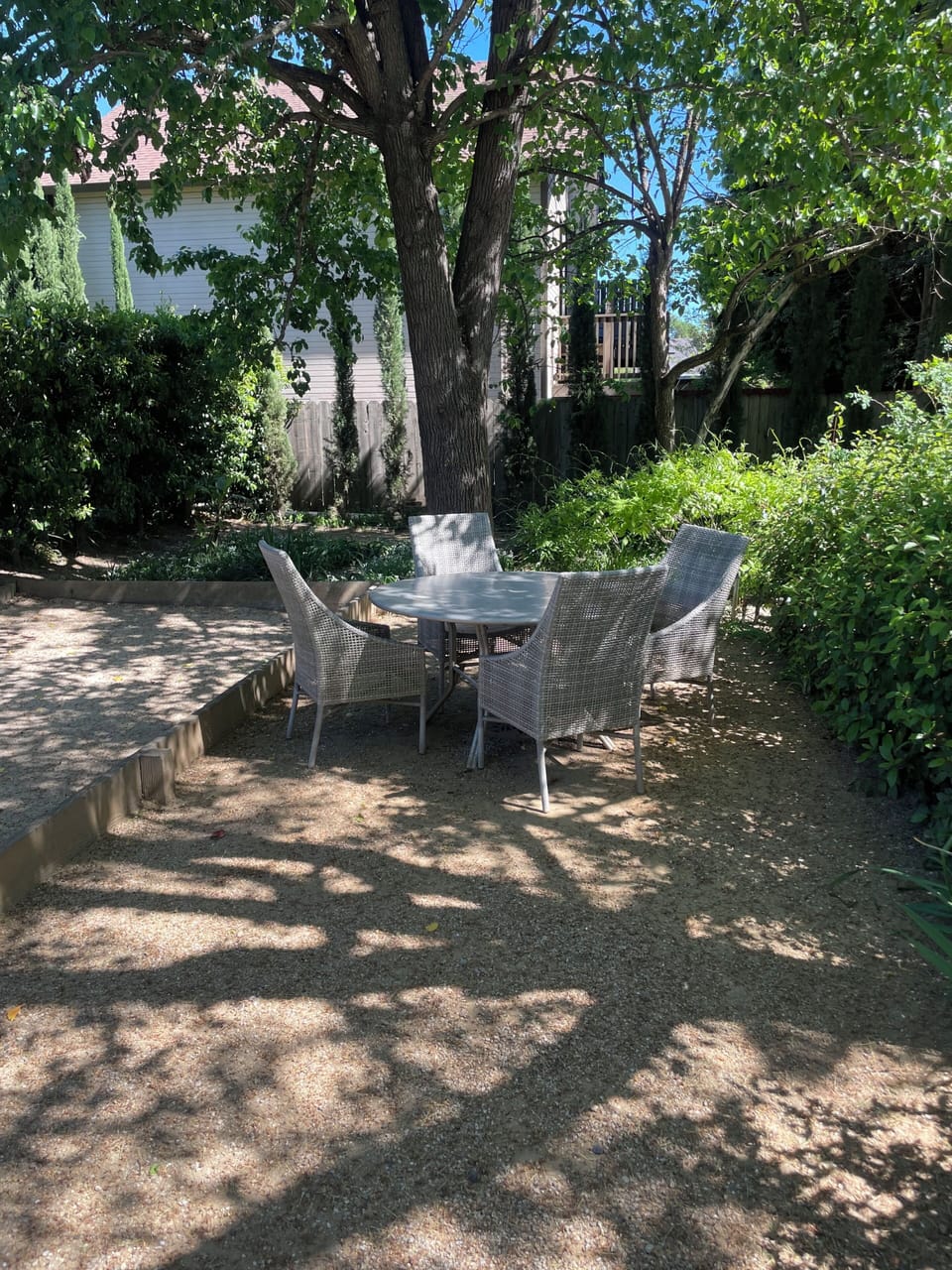 Table and chairs by Bocce Court