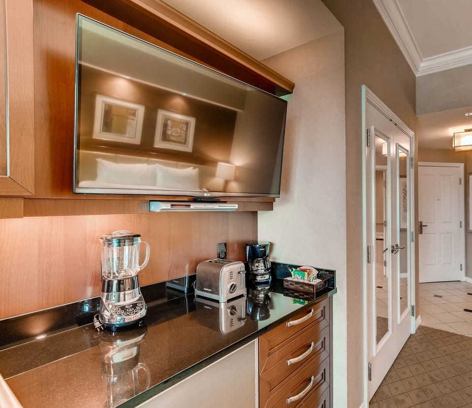 Kitchen with microwave, blender, toaster regular coffee maker