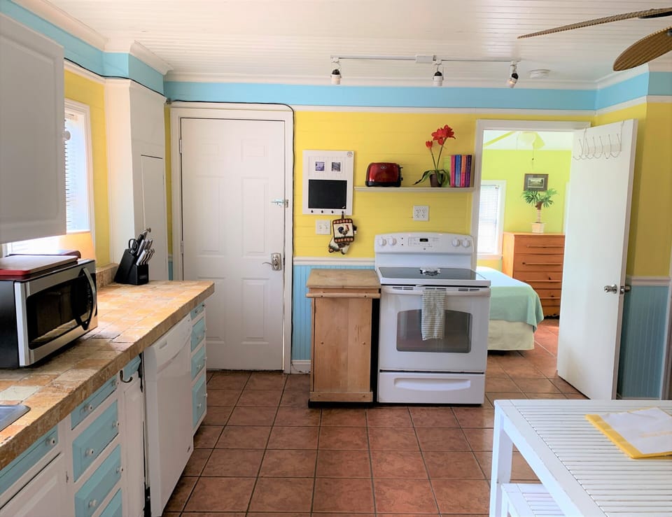 Kitchen and entry. 