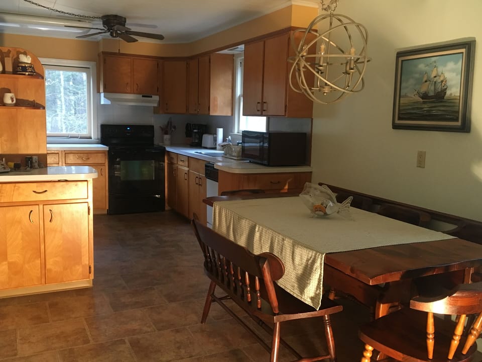Fully stocked kitchen even has a waterview!  and a dishwasher!