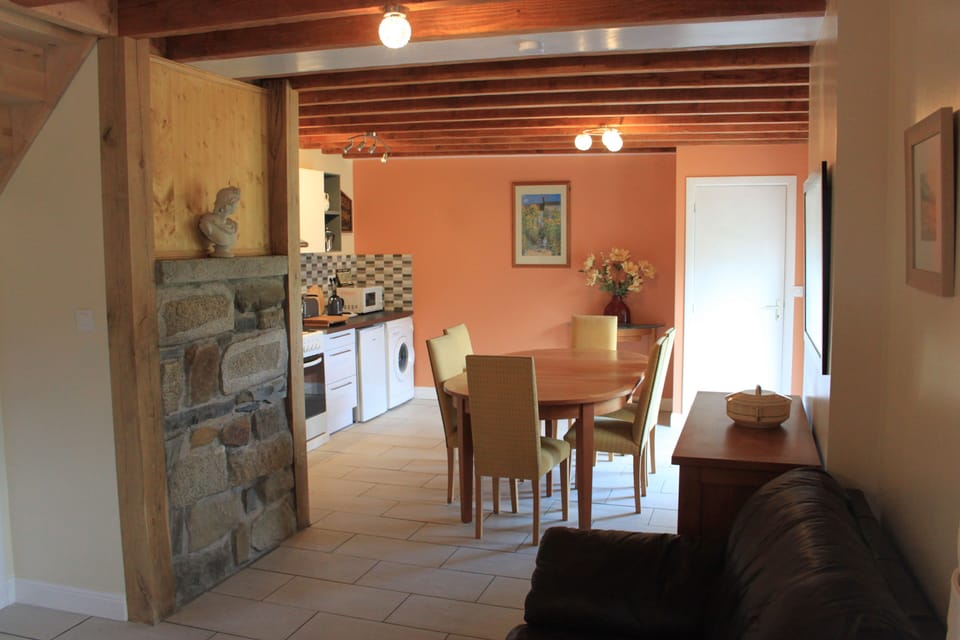 The kitchen and dinnng are looking from the lounge.
