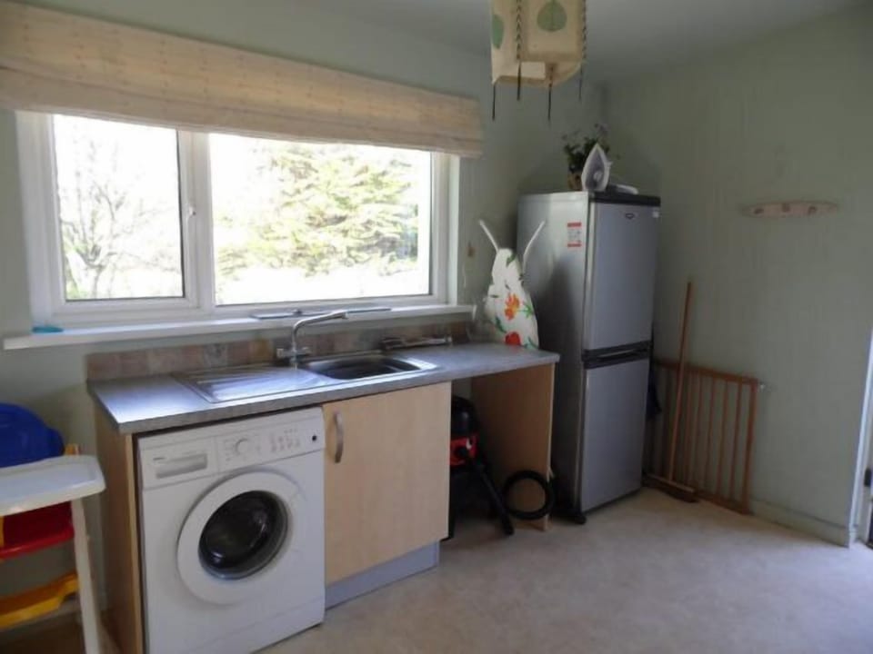 Separate utility room great wet dog space leads to back gardens