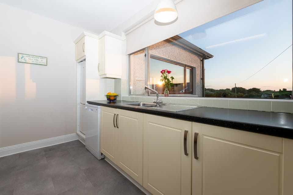 Kitchen looks westward, With 60/40 Fridge/Freezer, Coffee-maker, Kettle, etc. 