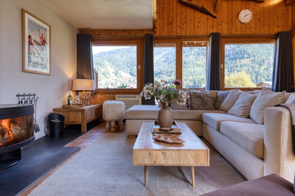 Large, comfortable main room with wood burning stove & lovely mountain views