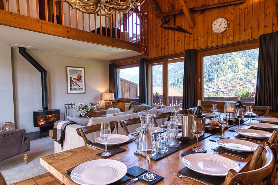 The main room includes a large and very heavy 12-seater oak table