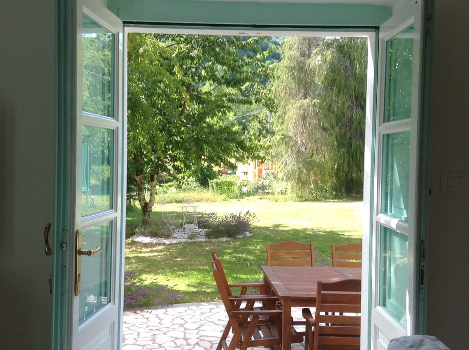 The front terrace and garden from one of the sitting rooms