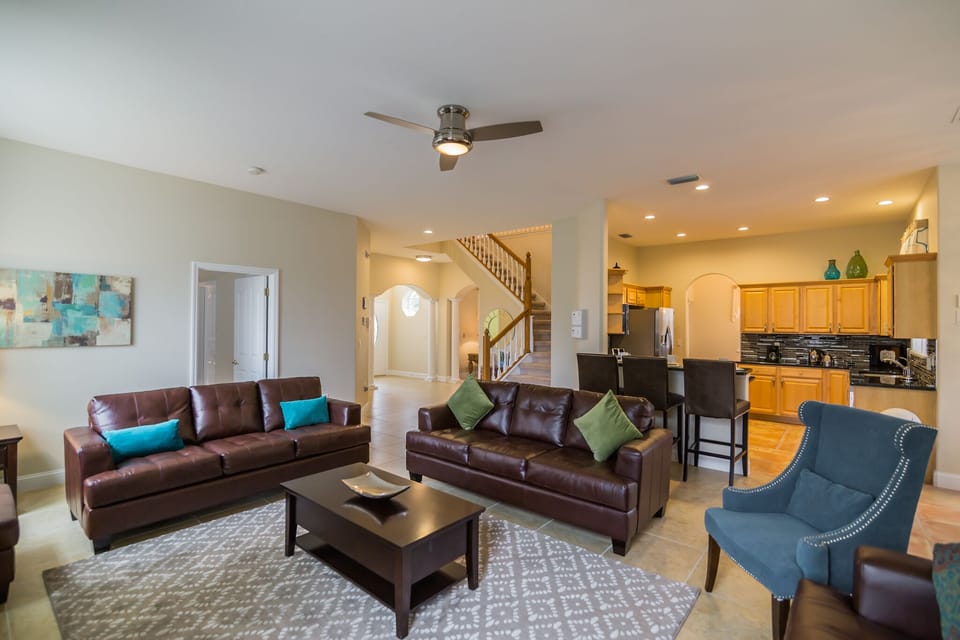 Large comfortable open plan lounge area adjoining the kitchen and dining area.
