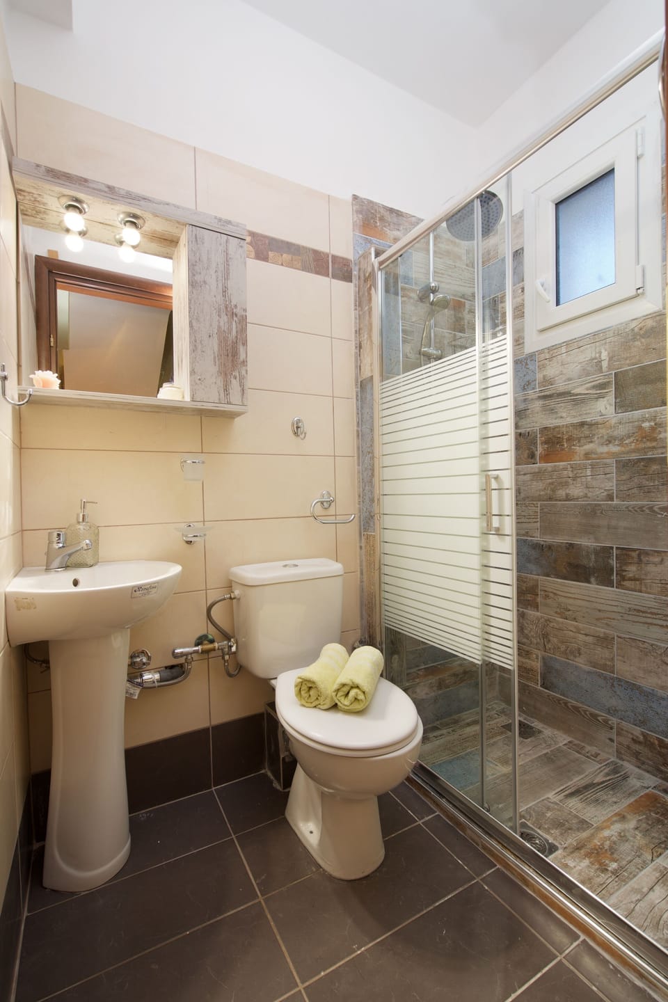 VIEW OF OUR BATHROOM ON THE GROUND FLOOR WITH SHOWER CABIN