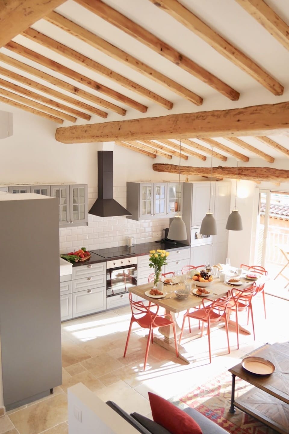 Open plan kitchen and living area, opening direct to large terrace