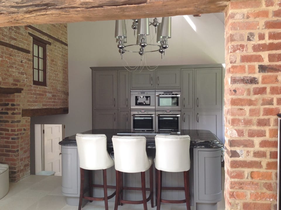 Kitchen to include huge granite island with hob