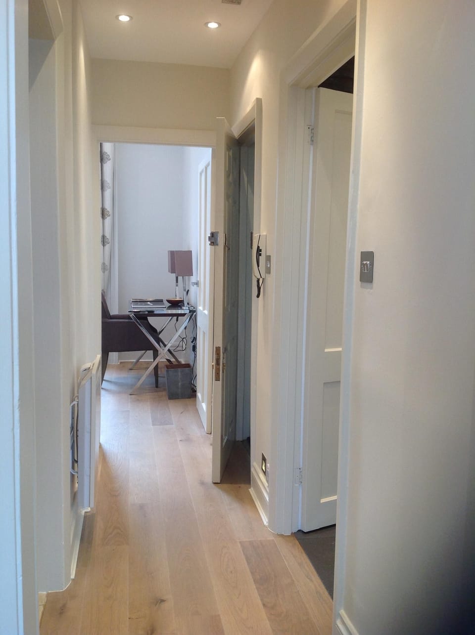 Corridor with view towards the bedroom.