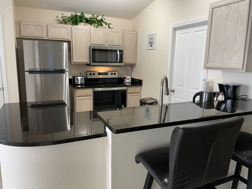 Fully equipped kitchen with new stainless steel appliances