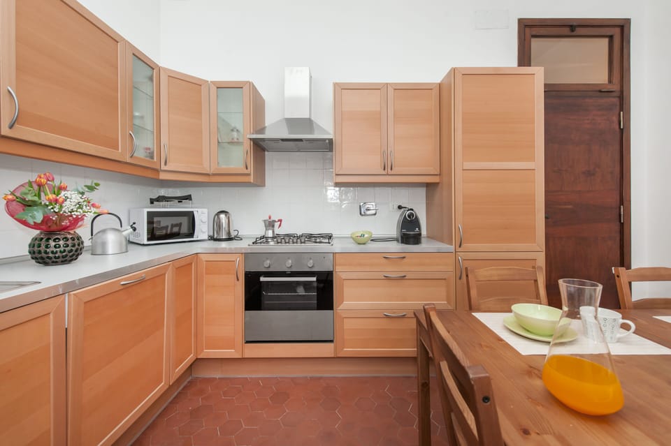 Big kitchen with dining table for 7 people