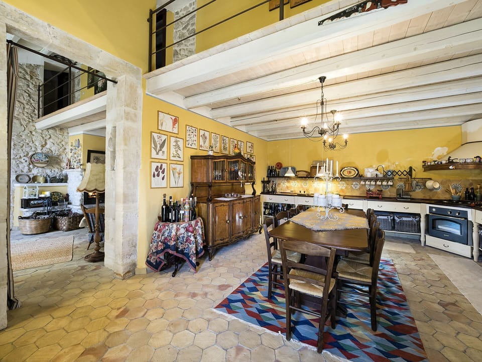 Spacious kitchen with dining table