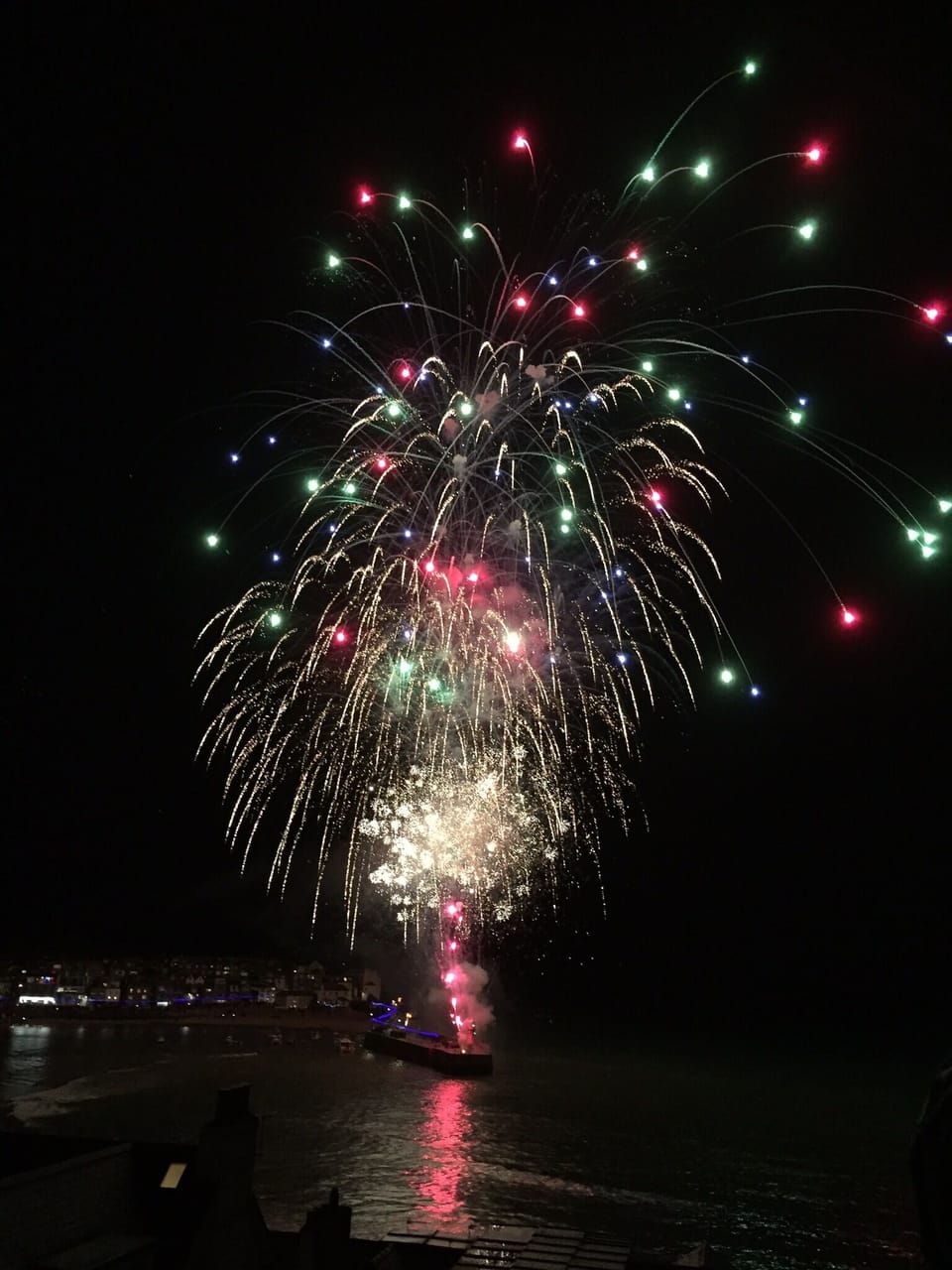 New Year celebrations, fireworks on the end of Smeaton's pier, harbour, St Ives