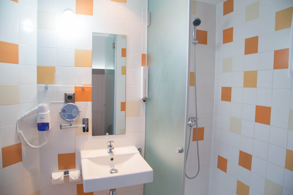Shower, towels, soap, shampoo