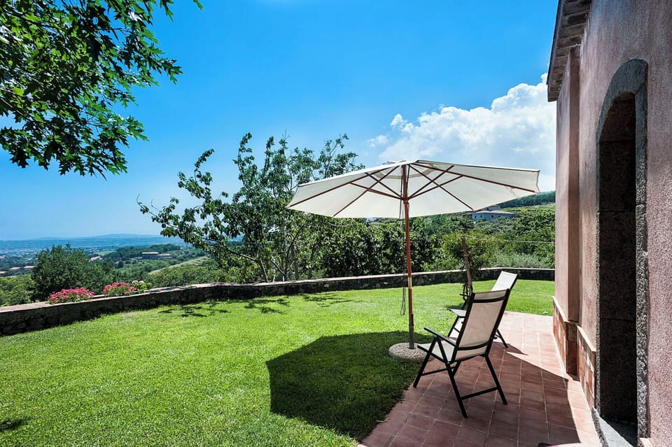 Fully equipped garden with furniture.